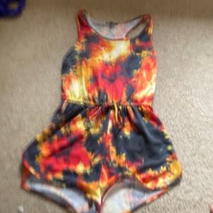This is a red, fiery romper, only worn one time to a graduation party